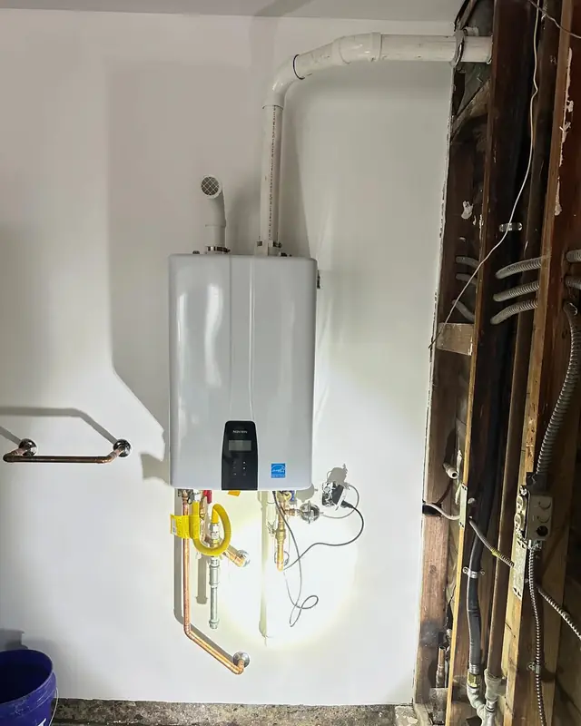 Installed tankless water heater with copper and gas connections